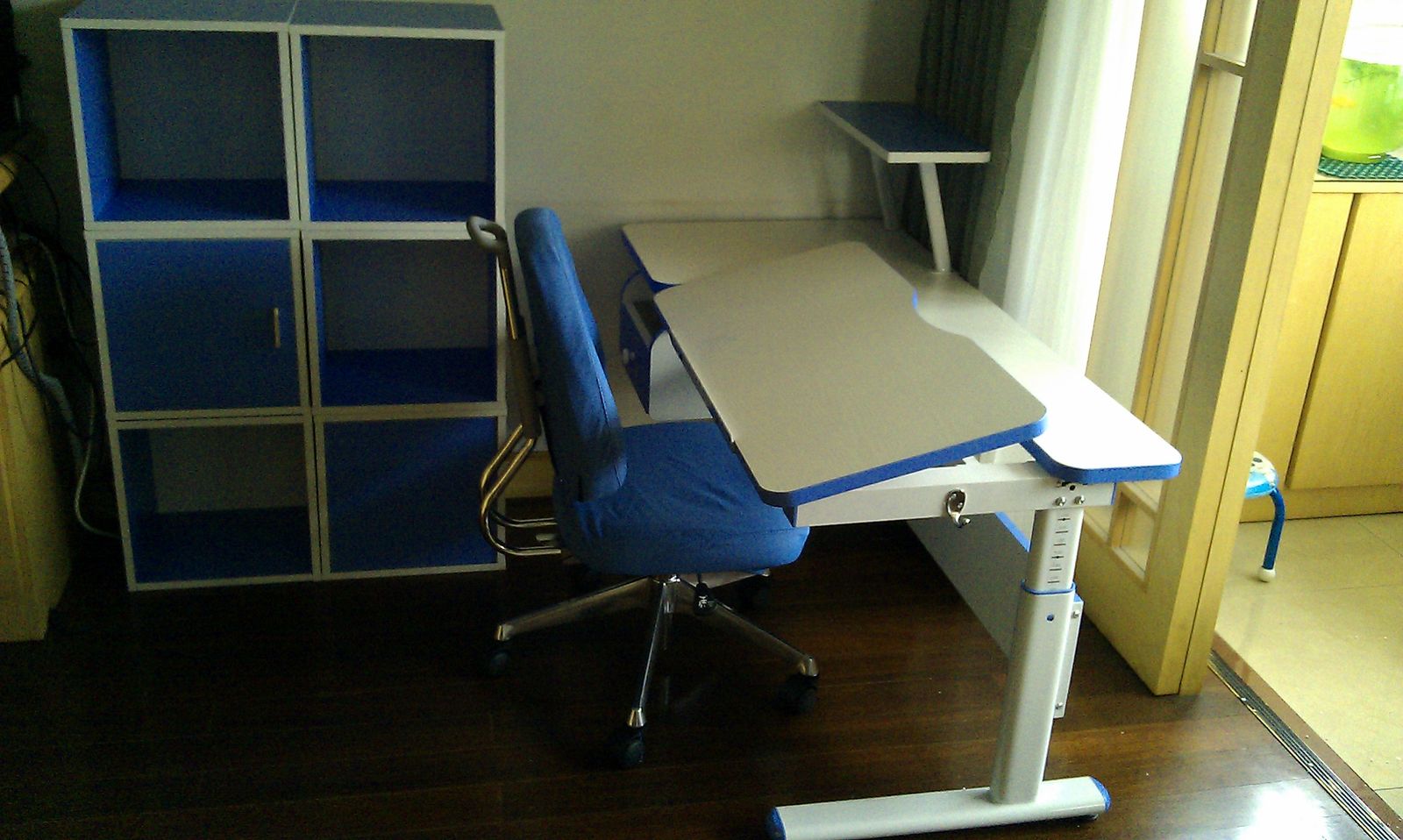 Finished blue and white desk and cube shelf